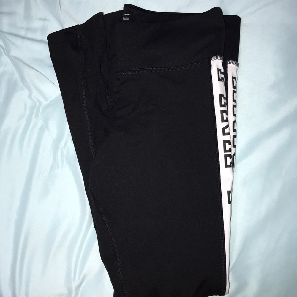Black leggings with White stripe down side